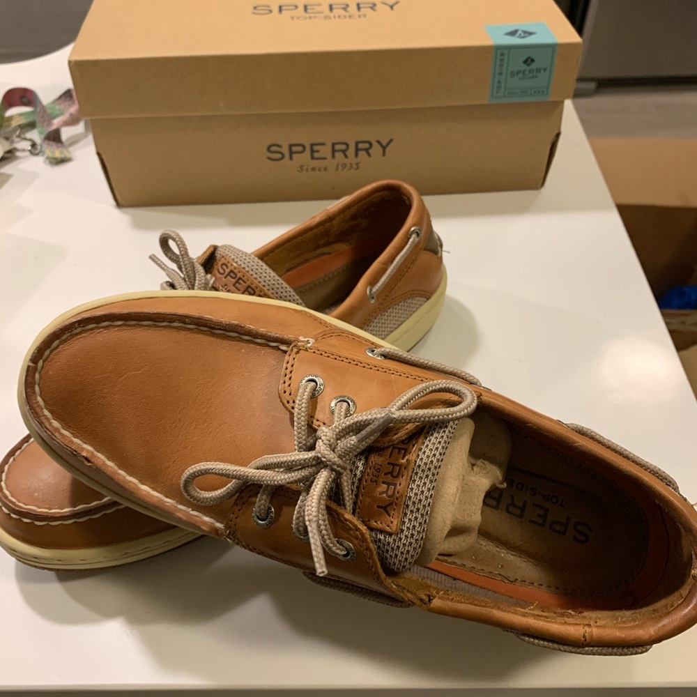 Brand new never worn still in the box, size 10M